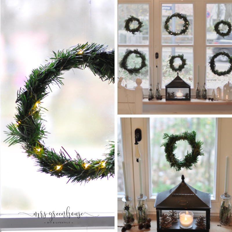 Tannenkränze im Fenster