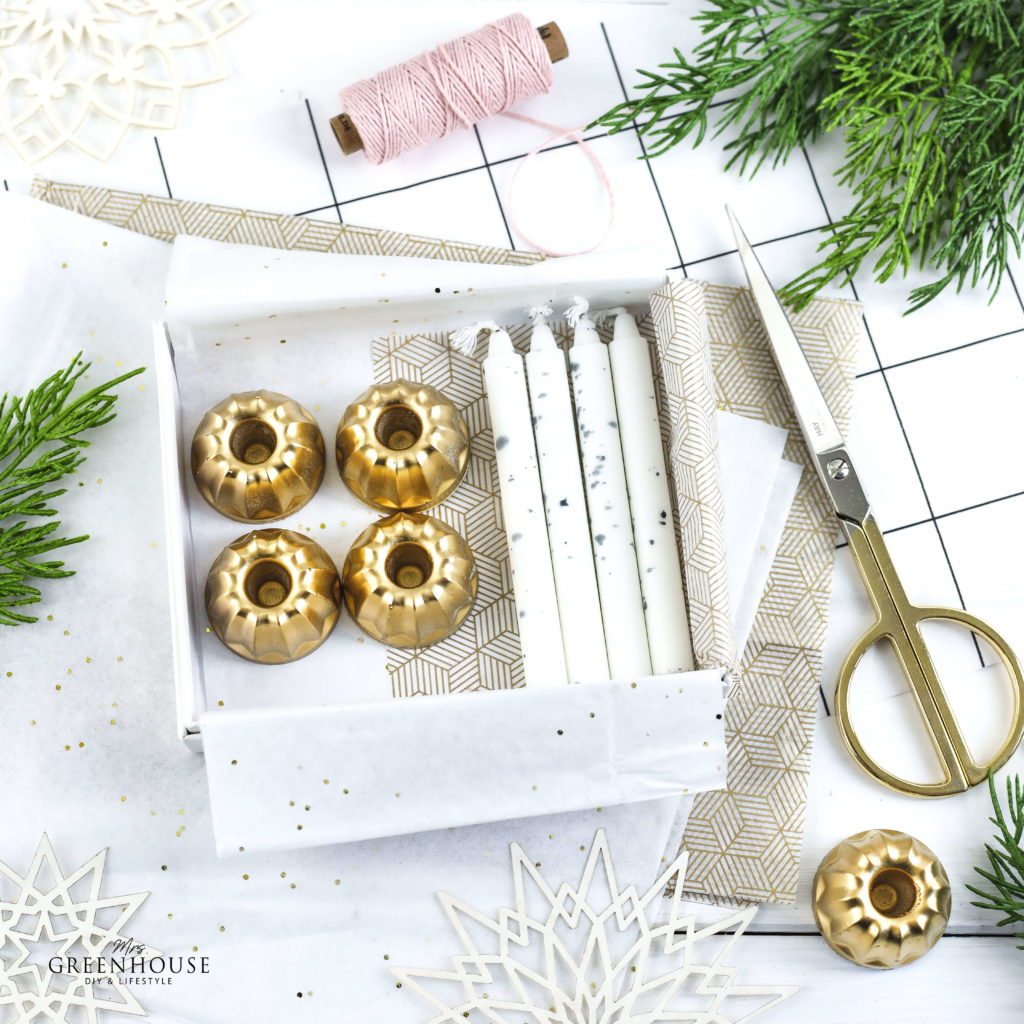 Kerzenständer aus Beton mit Goldspray verziert