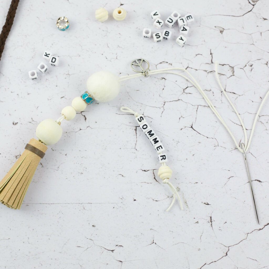 Boho Schlüsselanhänger mit Kunstleder Quasten