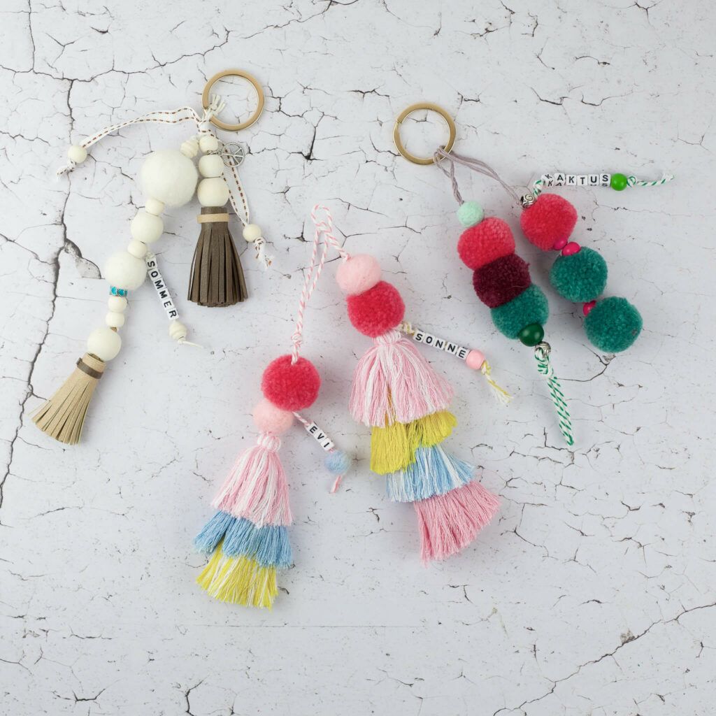 Schlüsselanhänger und Accessoires aus Pompons und Quasten selber machen