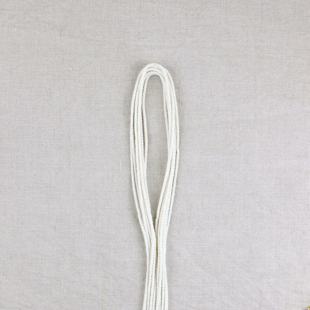 Schlaufe für Aufhängung legen