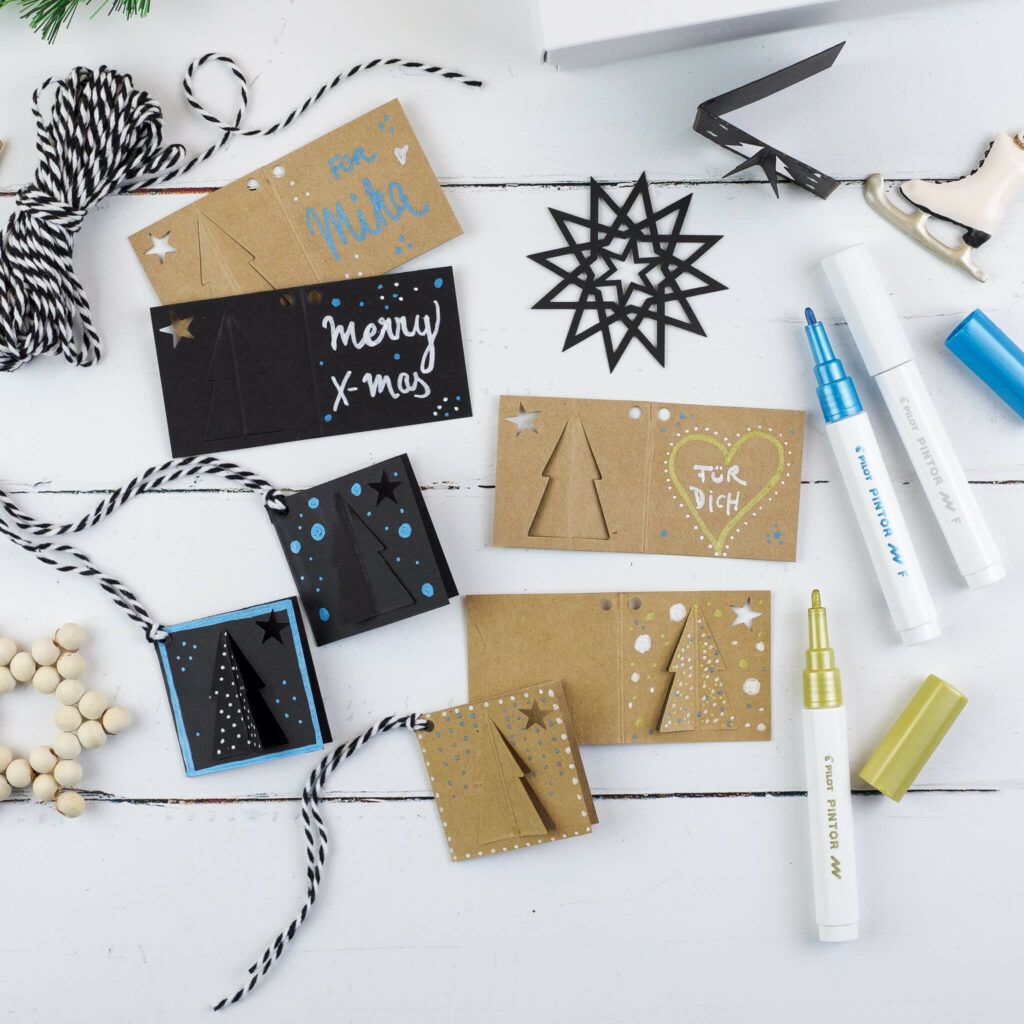 Geschenkanhänger mit Kreativmarkern verzieren