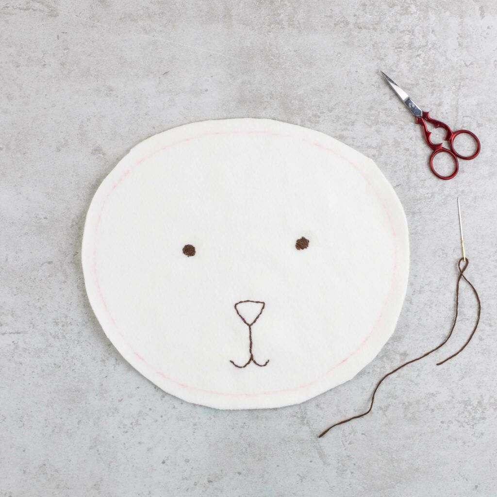 Kirschkernkissen Bär Gesicht sticken