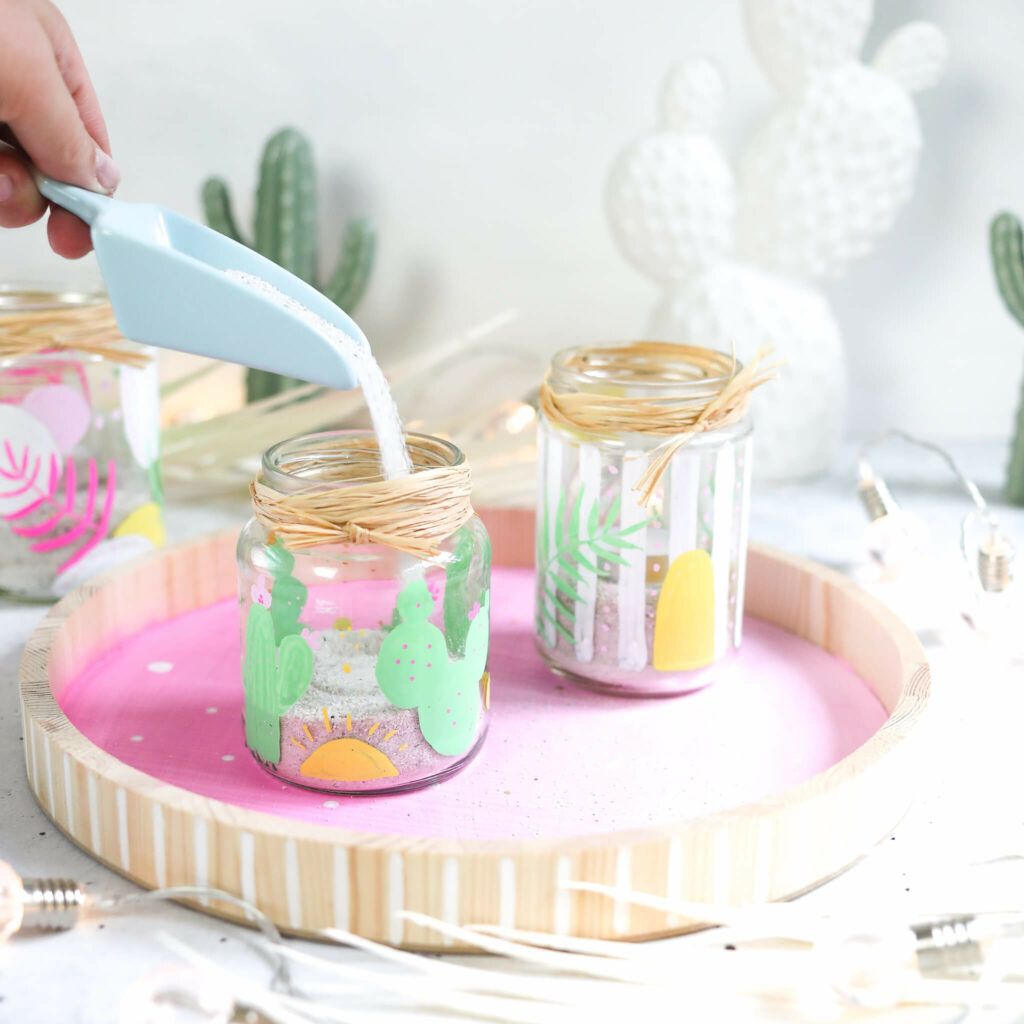 Windlichter mit Sand auffüllen