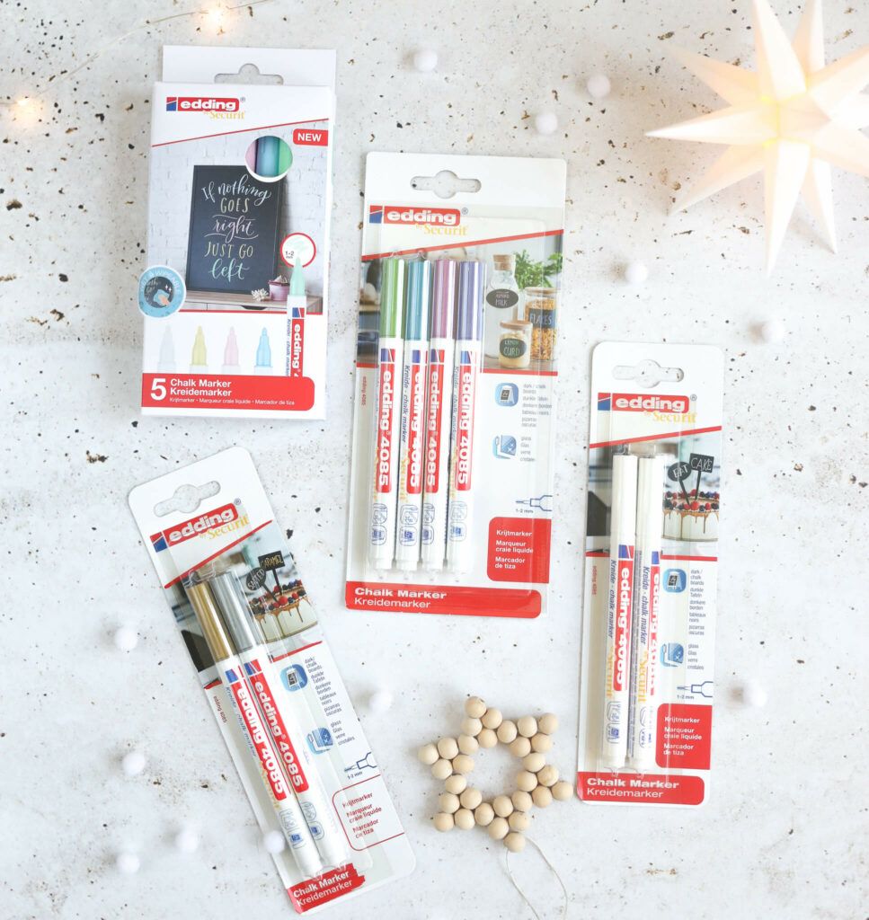 Fensterbilder im Winter und Weihnachtskugeln bemalen